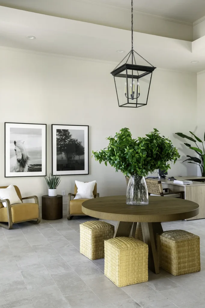 Bell Stonegate Leasing office lobby with arm chairs and tables